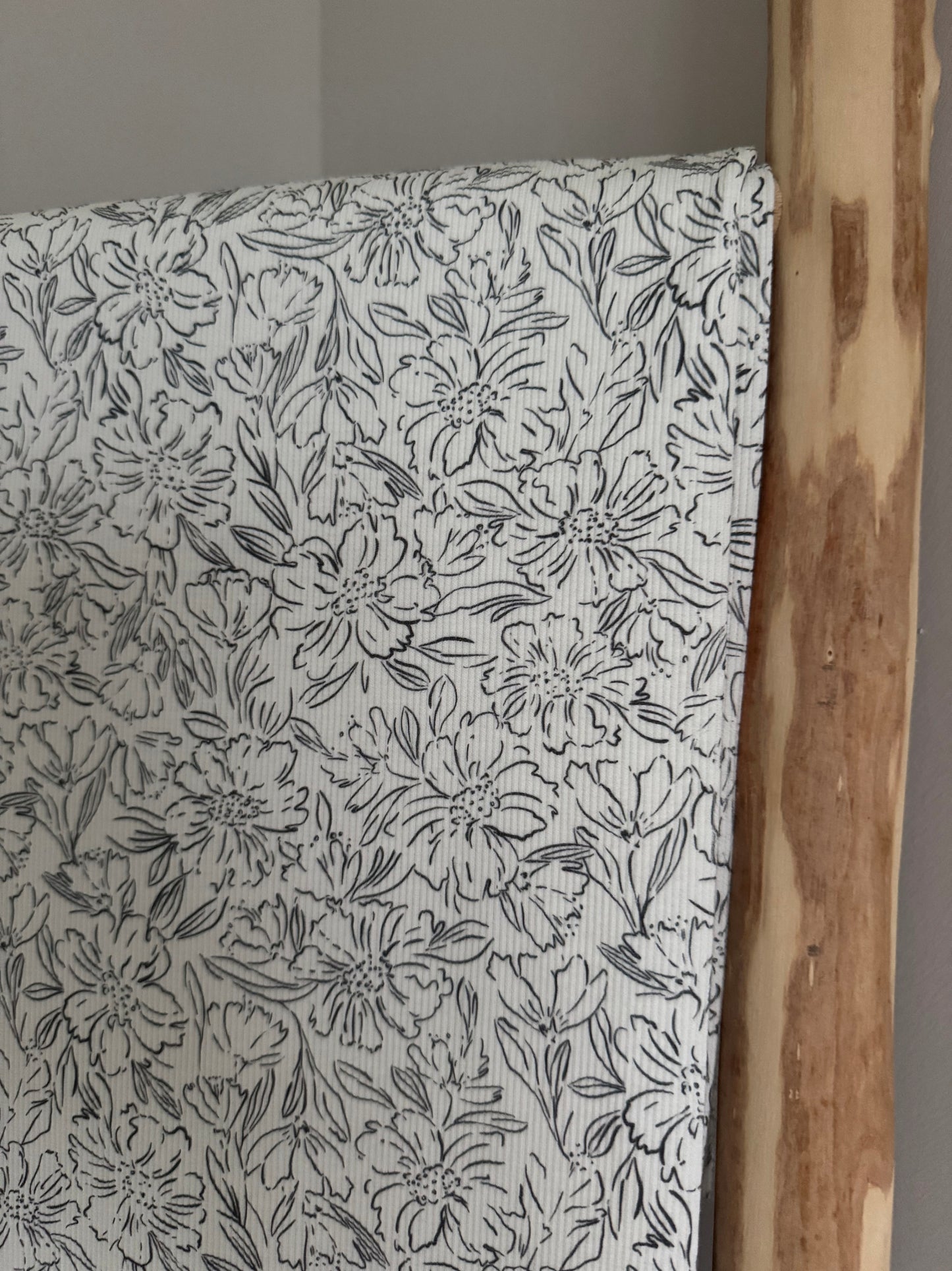 RIBTRICOT GEVALLEN BLOEMEN