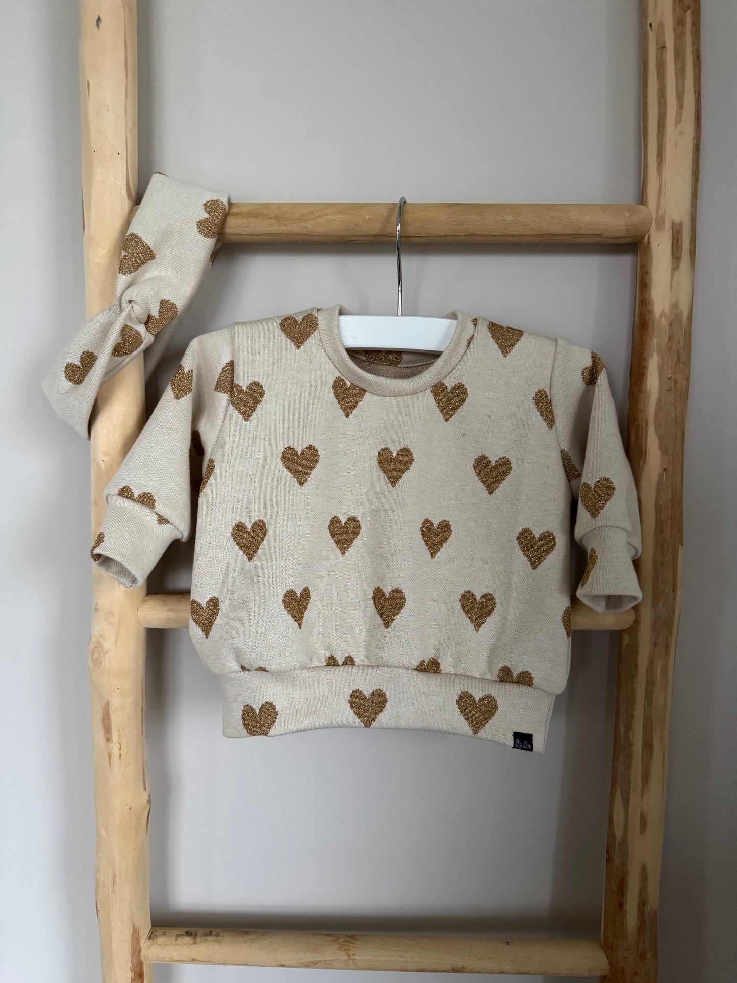 JACQUARD GEBREID LUREX HARTJES GOUD